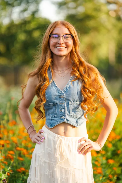 Senior portrait among flowers